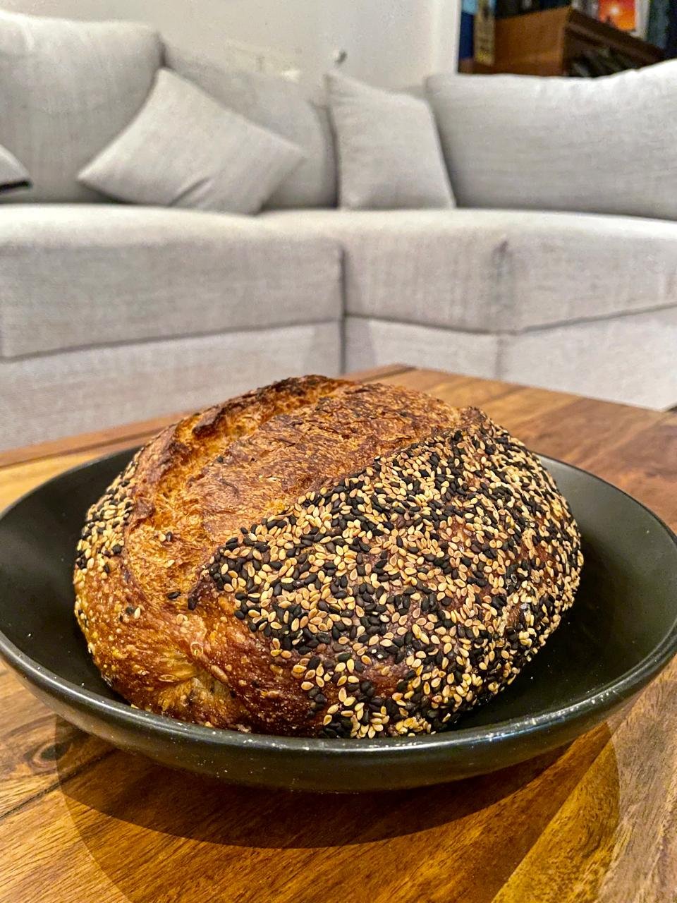 healthy multigrain sourdough loaf with sesame seeds